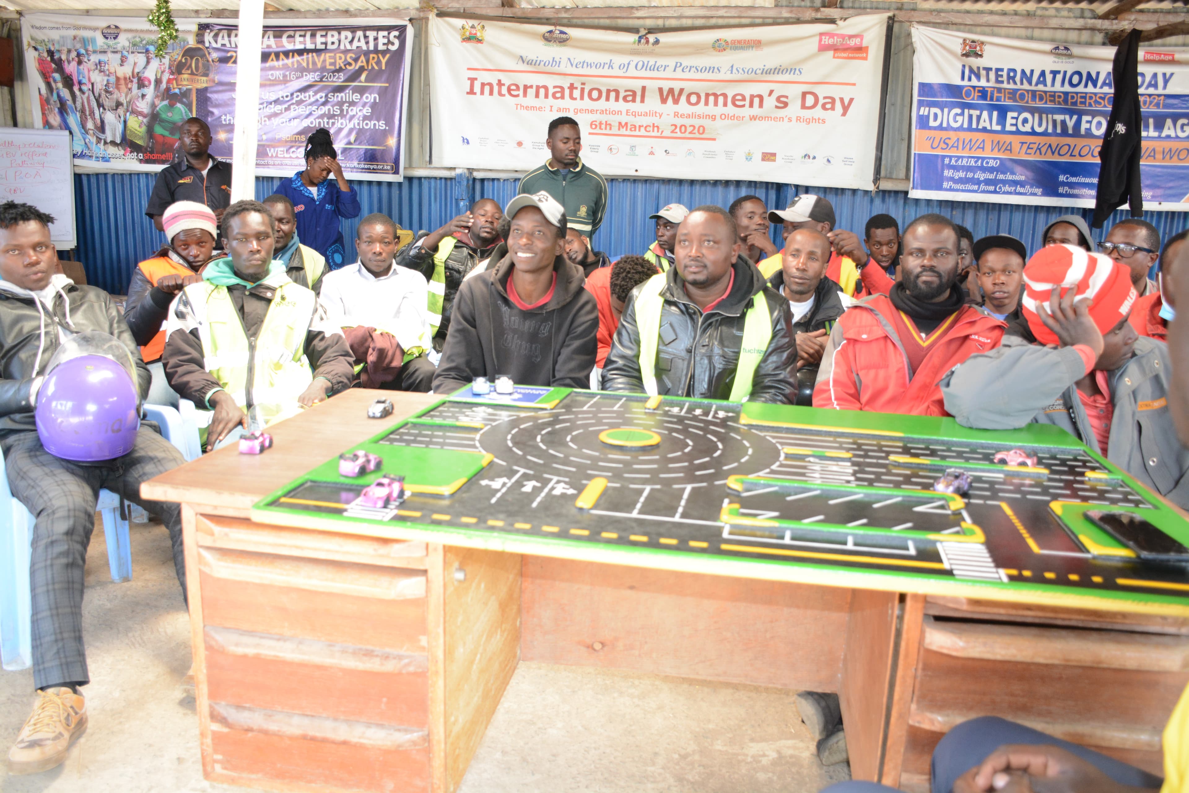 Group of riders participating in an ARUSi helmet-safety activity in Riruta.