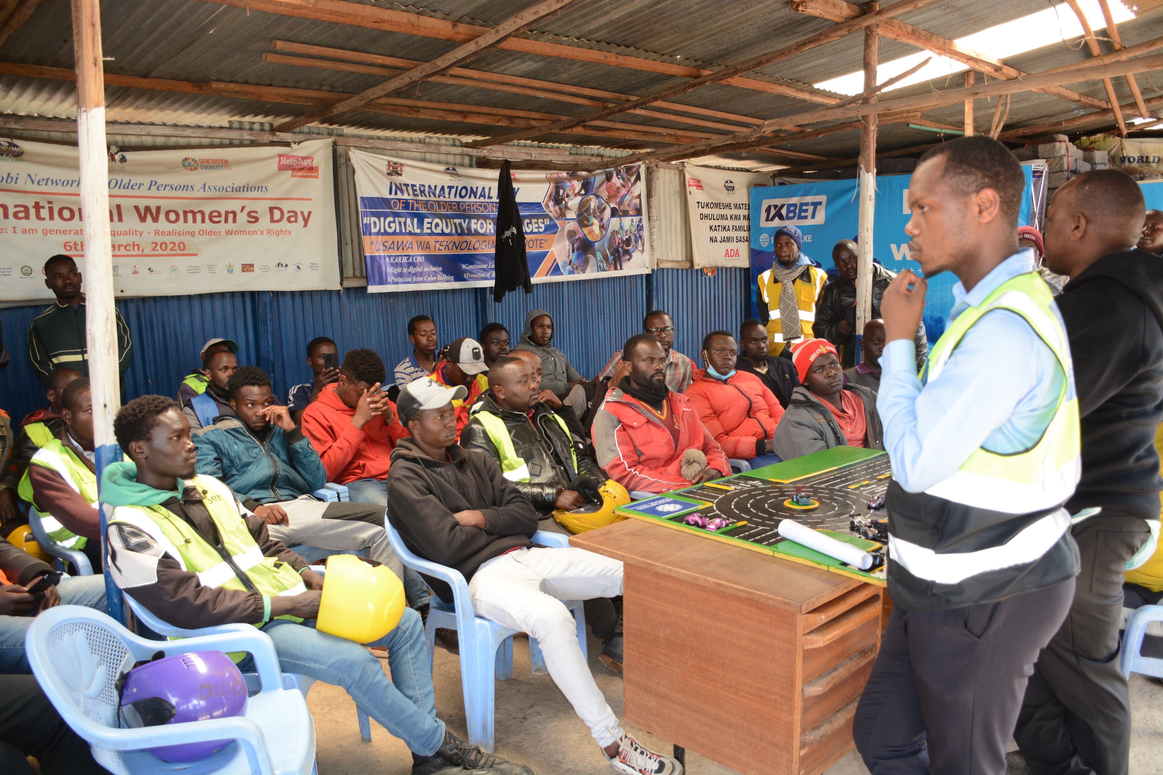 Riders receive practical helmet-use guidance during an ARUSi bodaa session.